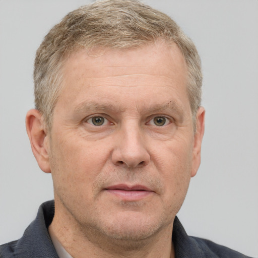 Neutral white middle-aged male with short  brown hair and grey eyes