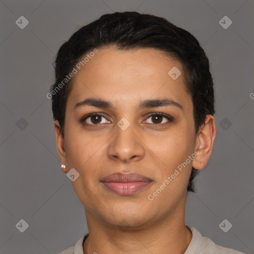 Joyful latino young-adult female with short  black hair and brown eyes