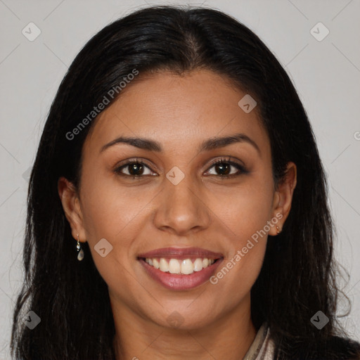 Joyful latino young-adult female with long  brown hair and brown eyes