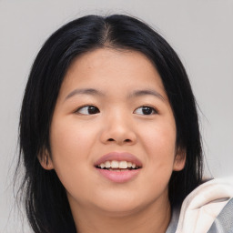 Joyful asian young-adult female with medium  black hair and brown eyes