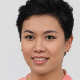 Joyful asian young-adult female with short  brown hair and brown eyes