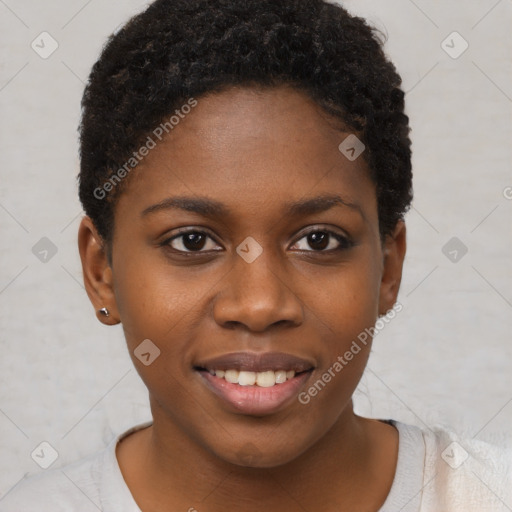 Joyful black young-adult female with short  brown hair and brown eyes