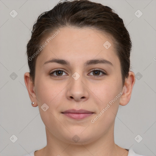 Joyful white young-adult female with short  brown hair and brown eyes