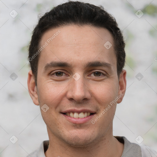 Joyful white young-adult male with short  brown hair and brown eyes