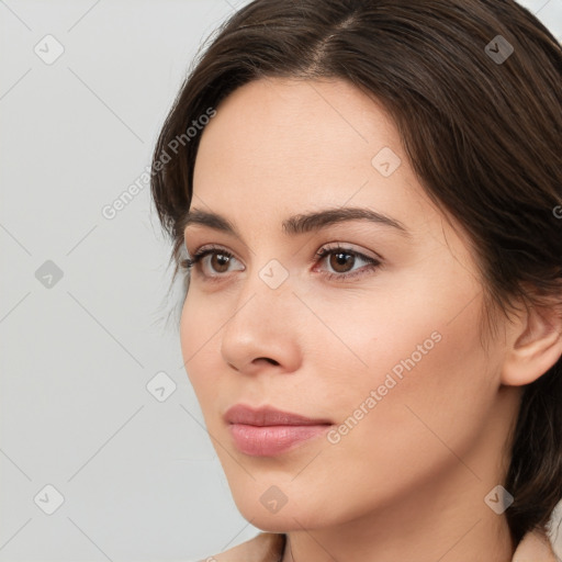 Neutral white young-adult female with medium  brown hair and brown eyes