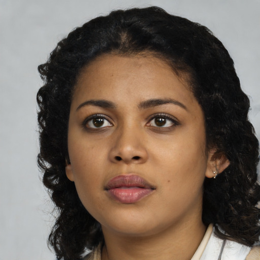 Neutral black young-adult female with long  black hair and brown eyes