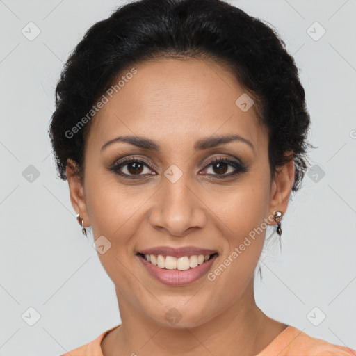 Joyful latino young-adult female with short  brown hair and brown eyes