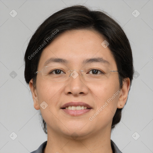 Joyful white adult female with medium  brown hair and brown eyes