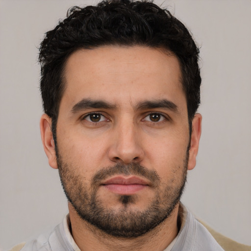Neutral white young-adult male with short  black hair and brown eyes