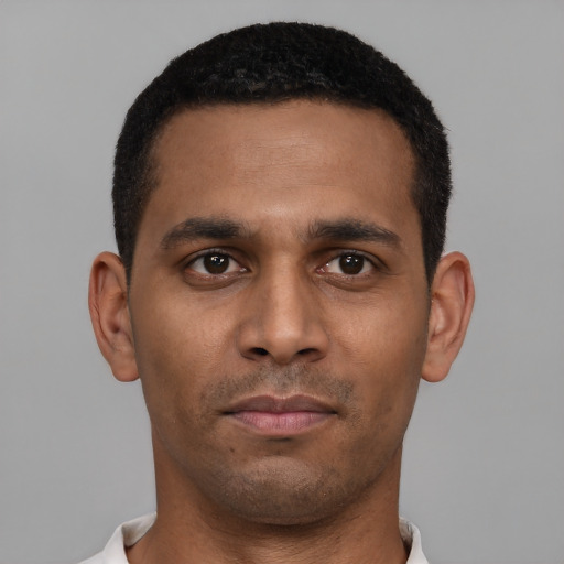 Neutral black young-adult male with short  black hair and brown eyes