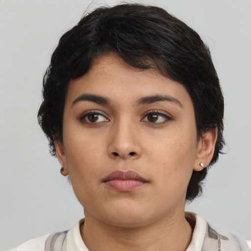 Neutral latino young-adult female with medium  black hair and brown eyes