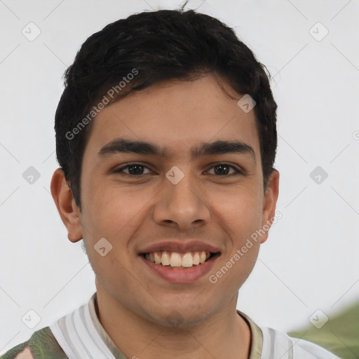 Joyful latino young-adult male with short  black hair and brown eyes