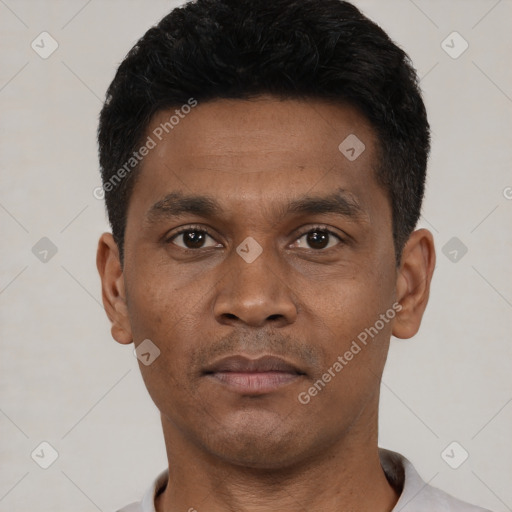 Neutral black young-adult male with short  black hair and brown eyes