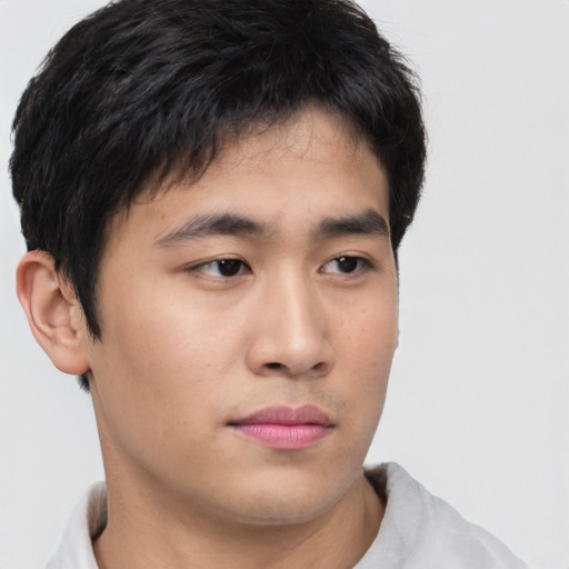 Neutral asian young-adult male with short  brown hair and brown eyes