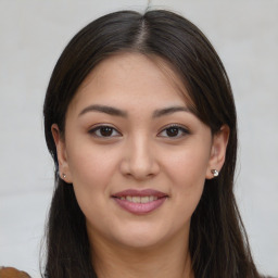 Joyful asian young-adult female with long  brown hair and brown eyes