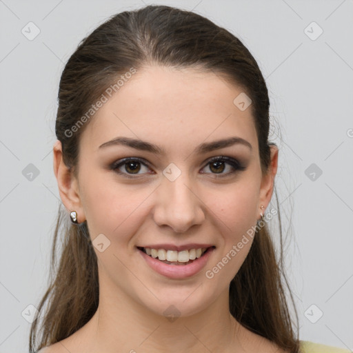 Joyful white young-adult female with medium  brown hair and grey eyes