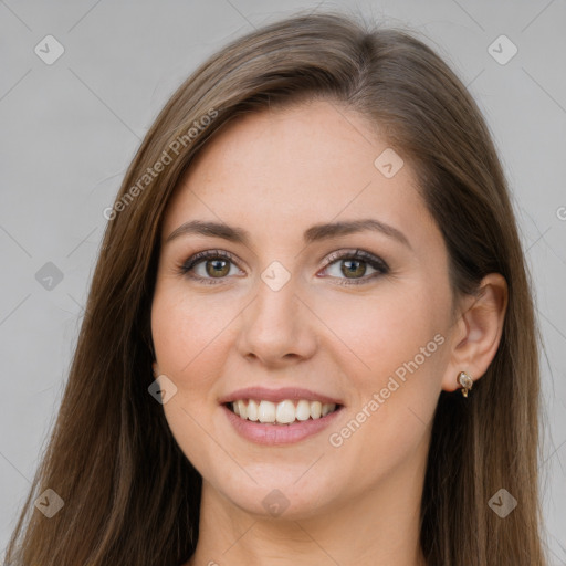 Joyful white young-adult female with long  brown hair and grey eyes