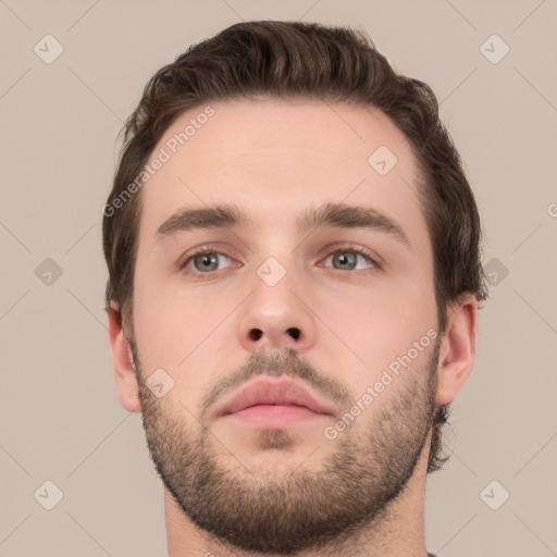 Neutral white young-adult male with short  brown hair and brown eyes