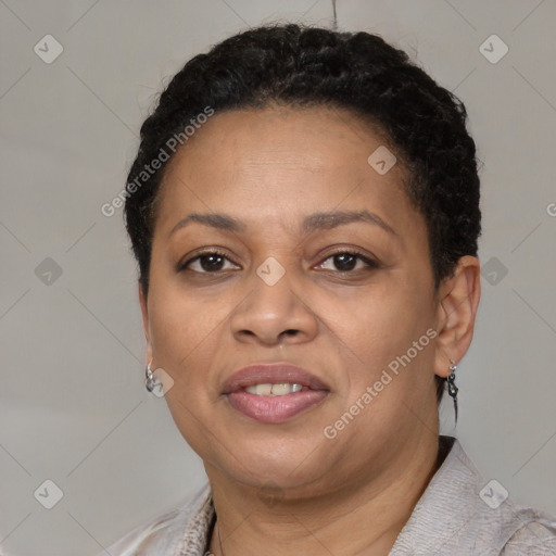 Joyful black adult female with short  brown hair and brown eyes