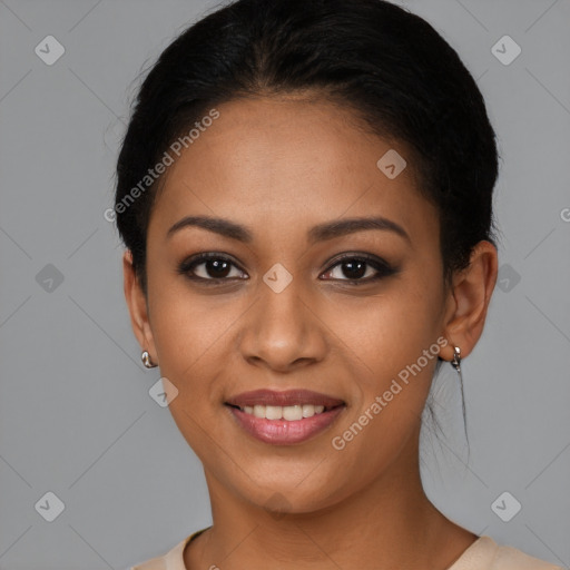 Joyful latino young-adult female with short  brown hair and brown eyes