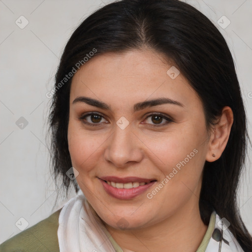 Joyful white young-adult female with medium  brown hair and brown eyes