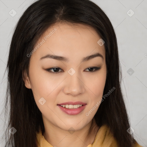 Joyful asian young-adult female with long  brown hair and brown eyes