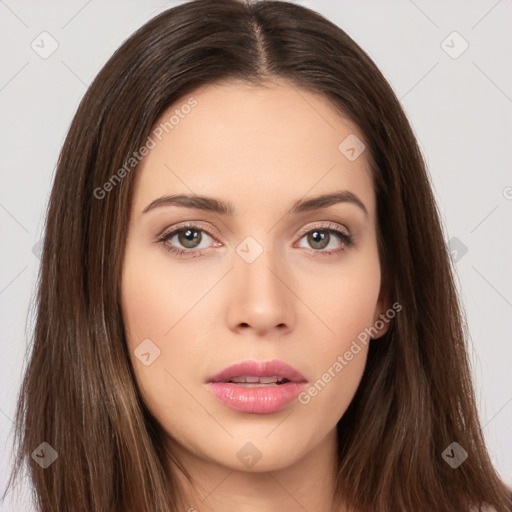 Neutral white young-adult female with long  brown hair and brown eyes