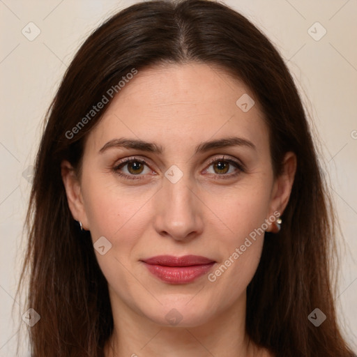 Joyful white young-adult female with long  brown hair and brown eyes