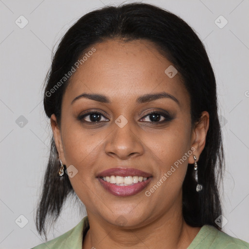 Joyful black young-adult female with medium  brown hair and brown eyes