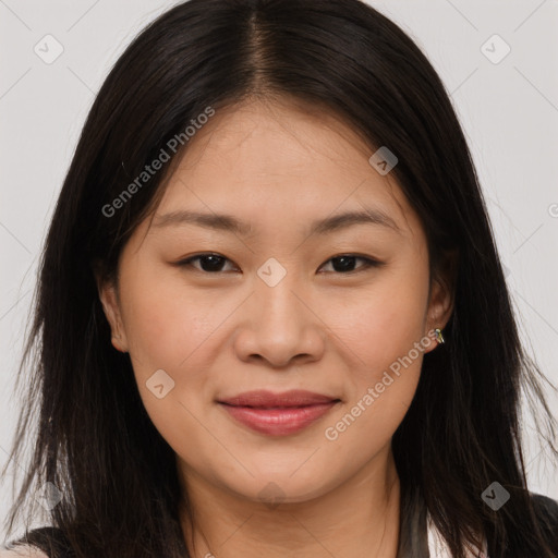 Joyful asian young-adult female with long  brown hair and brown eyes