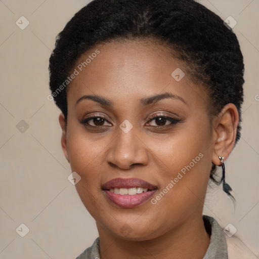 Joyful black young-adult female with medium  brown hair and brown eyes