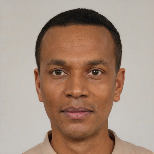 Neutral black young-adult male with short  black hair and brown eyes