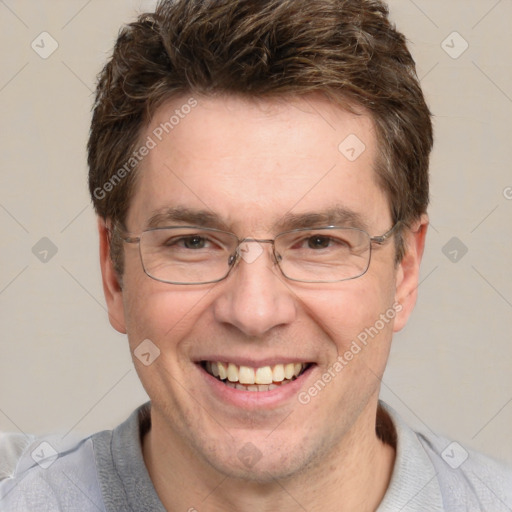 Joyful white adult male with short  brown hair and grey eyes