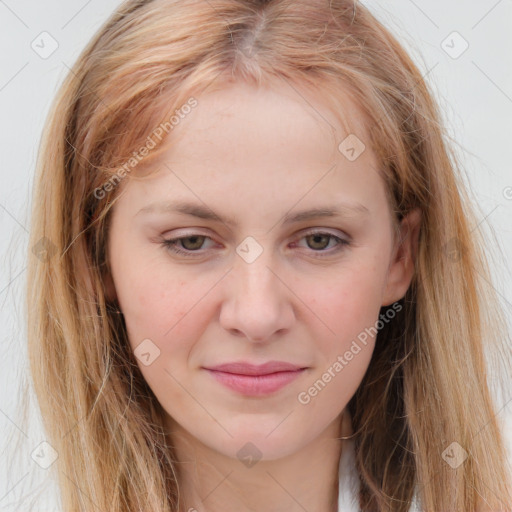 Joyful white young-adult female with long  brown hair and blue eyes