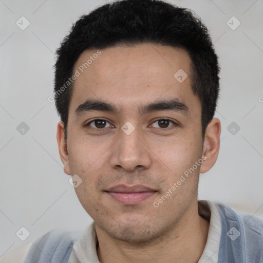 Joyful white young-adult male with short  black hair and brown eyes