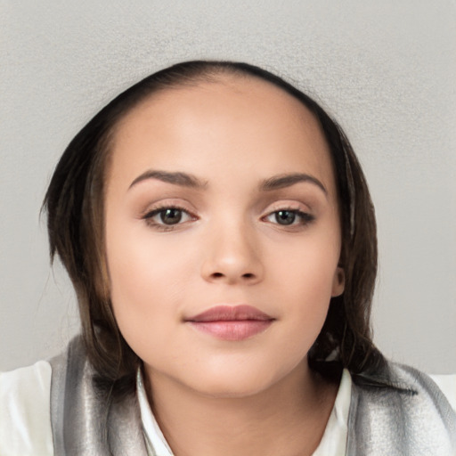 Neutral white young-adult female with medium  brown hair and brown eyes