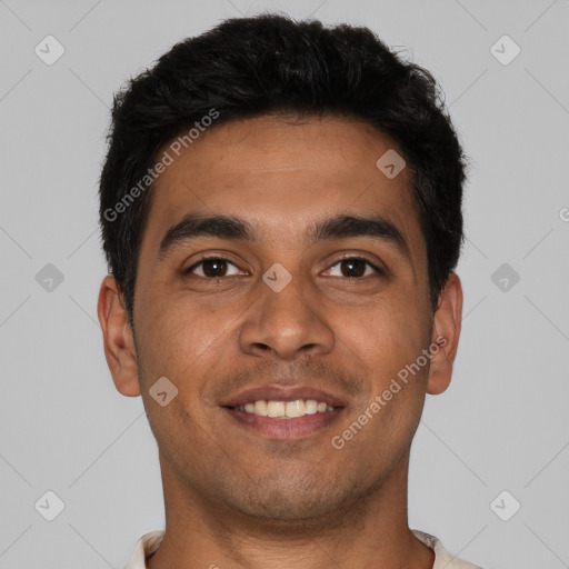 Joyful latino young-adult male with short  brown hair and brown eyes