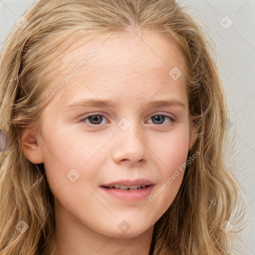 Joyful white child female with long  brown hair and brown eyes