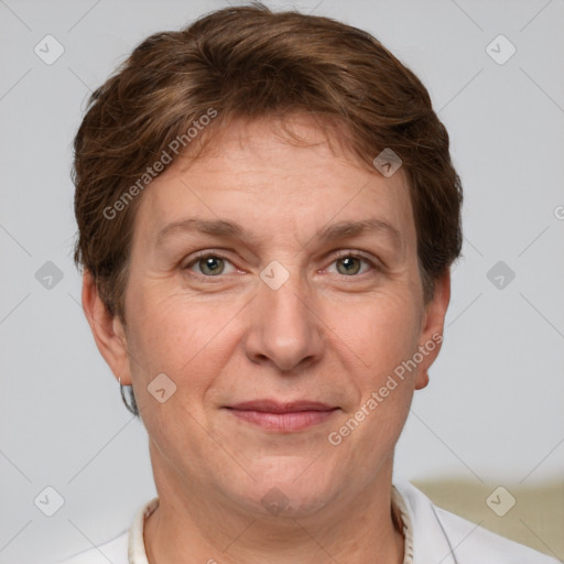 Joyful white adult female with short  brown hair and grey eyes