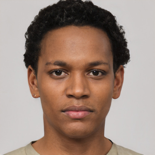 Neutral black young-adult male with short  black hair and brown eyes