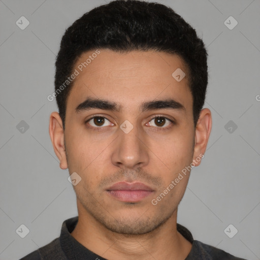 Neutral latino young-adult male with short  black hair and brown eyes