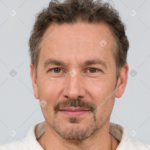 Neutral white adult male with short  brown hair and brown eyes