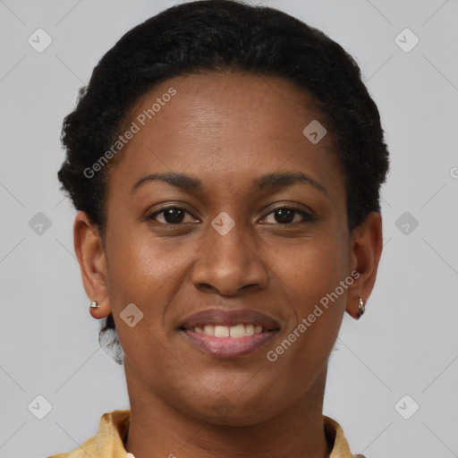 Joyful black young-adult female with short  brown hair and brown eyes