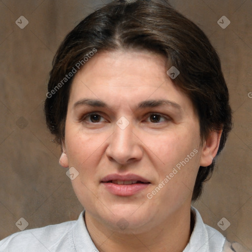 Joyful white adult female with short  brown hair and brown eyes