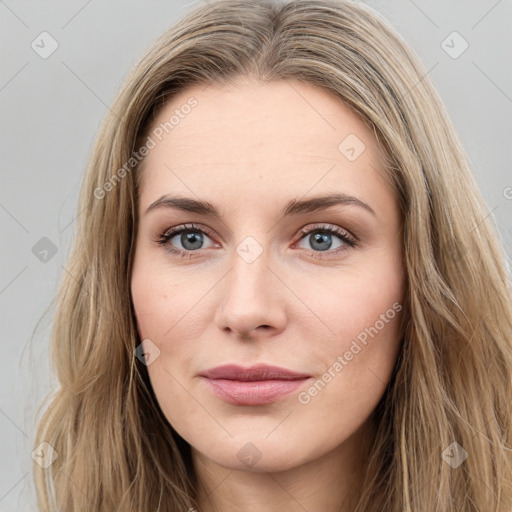 Joyful white young-adult female with long  brown hair and green eyes