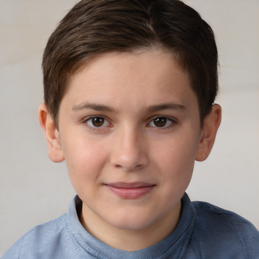 Joyful white child female with short  brown hair and brown eyes