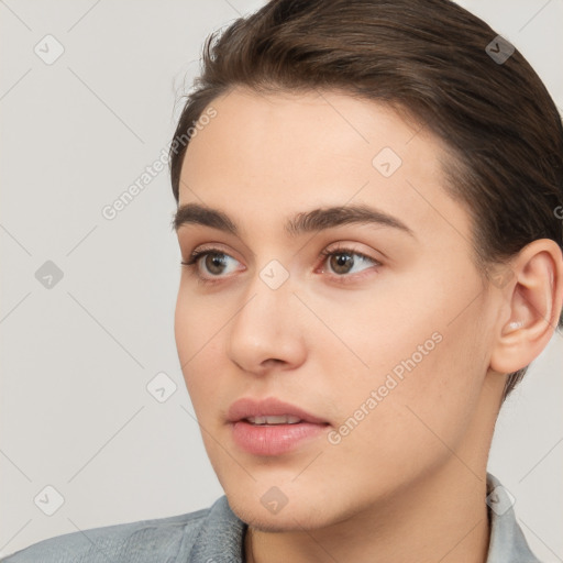 Neutral white young-adult female with short  brown hair and brown eyes