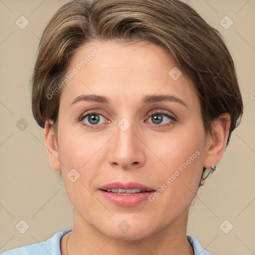 Joyful white young-adult female with short  brown hair and brown eyes