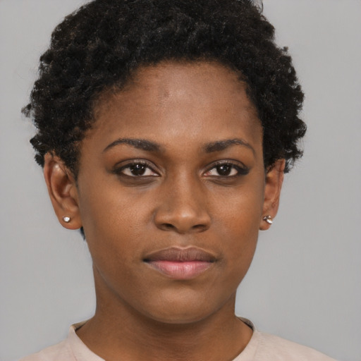 Neutral black young-adult female with short  brown hair and brown eyes