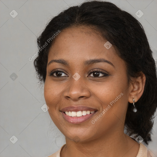 Joyful black young-adult female with medium  brown hair and brown eyes